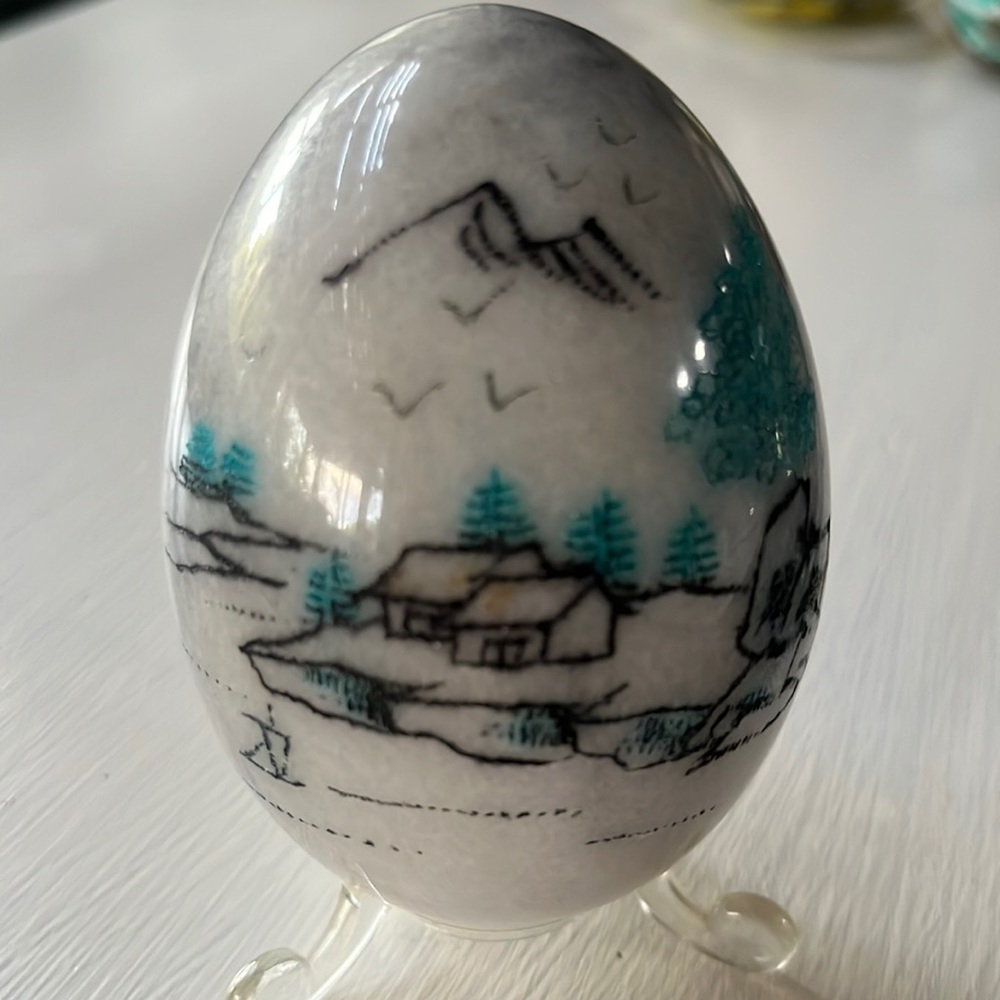 Vintage marble egg with etched mountain scene